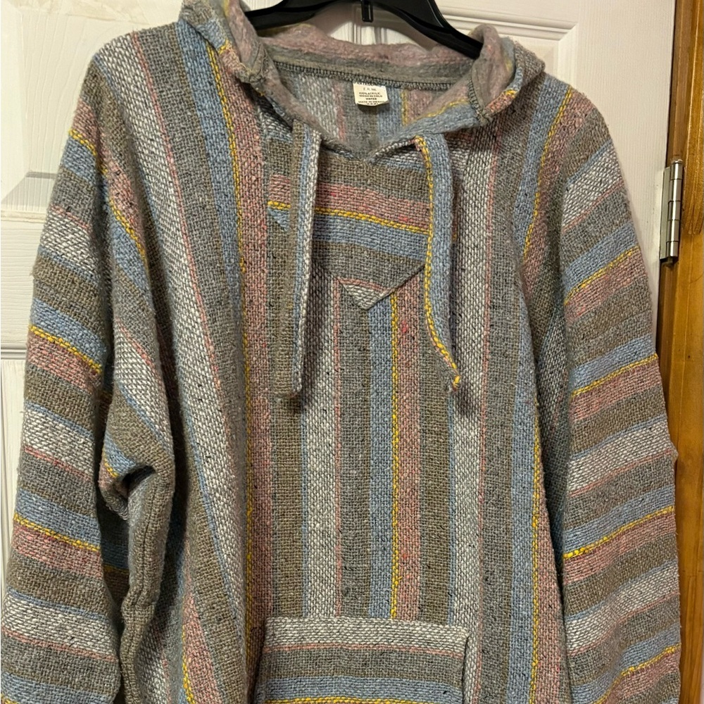 Sweater size 3XL with hoodie. Only worn once.